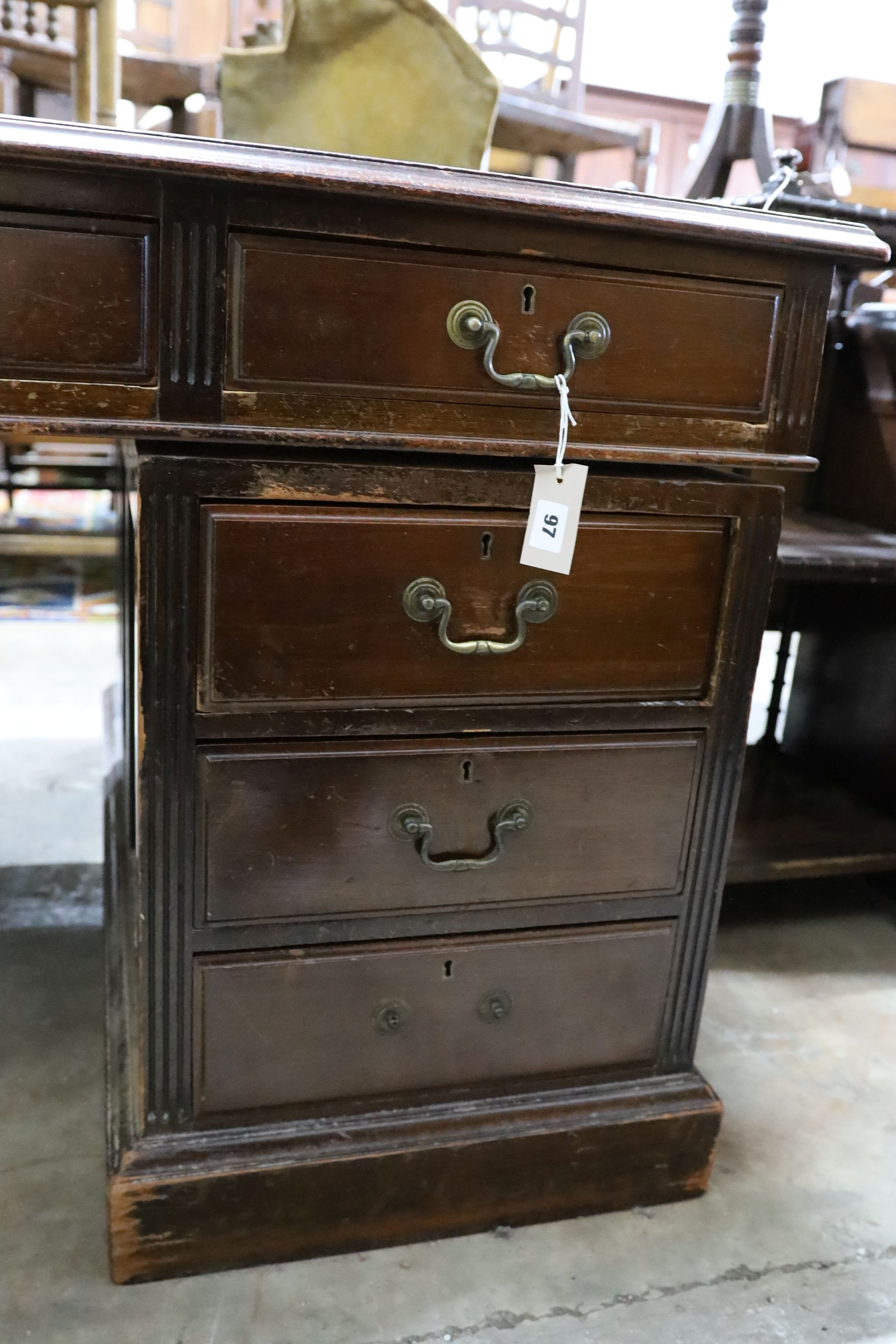 An early 20th century mahogany pedestal partner's desk, length 152cm, depth 112cm, height 77cm